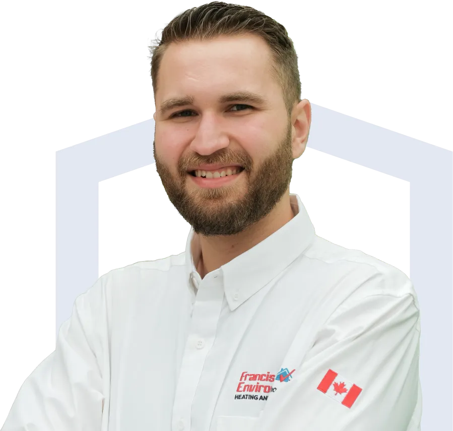 Francis team member in his white uniform, smiling broadly with teeth visible.